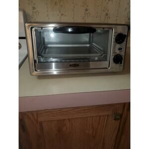 Bella 4 Slice Stainless Steel and Black Toaster Oven model MG10CDL And It Works
